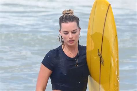 margot robbie toples|Surfing Margot Robbie Exposes Her Nipples In Sheer Bathing Suit.